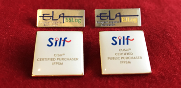 Bild på pins för Silfs internationella certifieringar